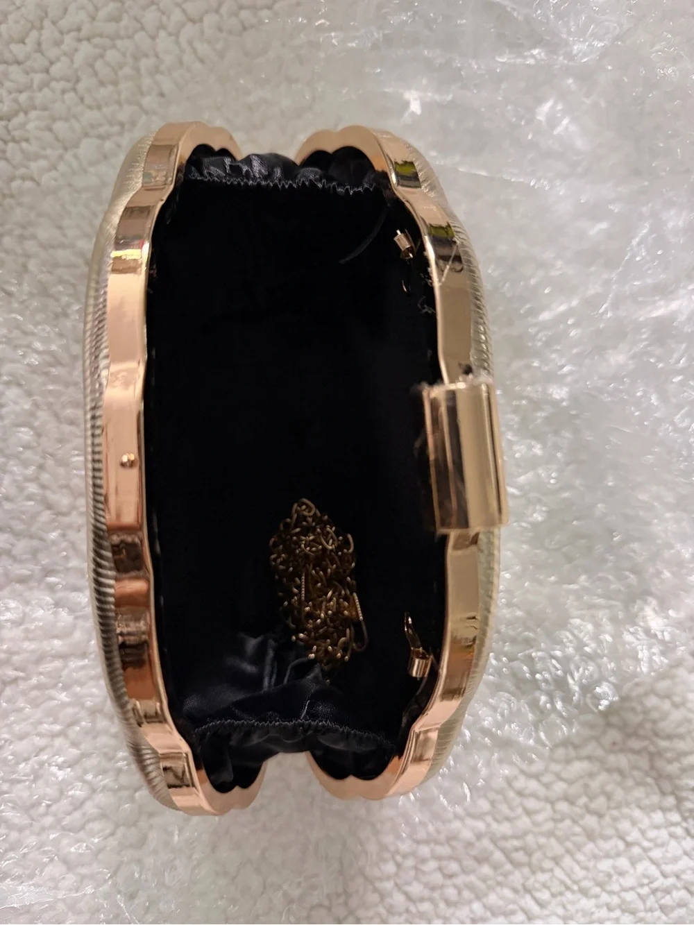 Gold Wave-Textured Evening Clutch with Top Clasp